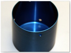 Valve cover made from 6061 aluminum with blue anodized finish.