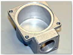Electrical assembly cap produced from 6061 aluminum in high production quantities.