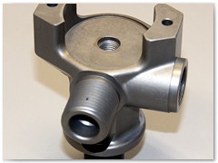 Oxygen valve body made from aluminum forging in single operation on horizontal machining center.