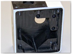Microscope multi-viewer body made from 6061 aluminum with anodize and powder coated finish.
